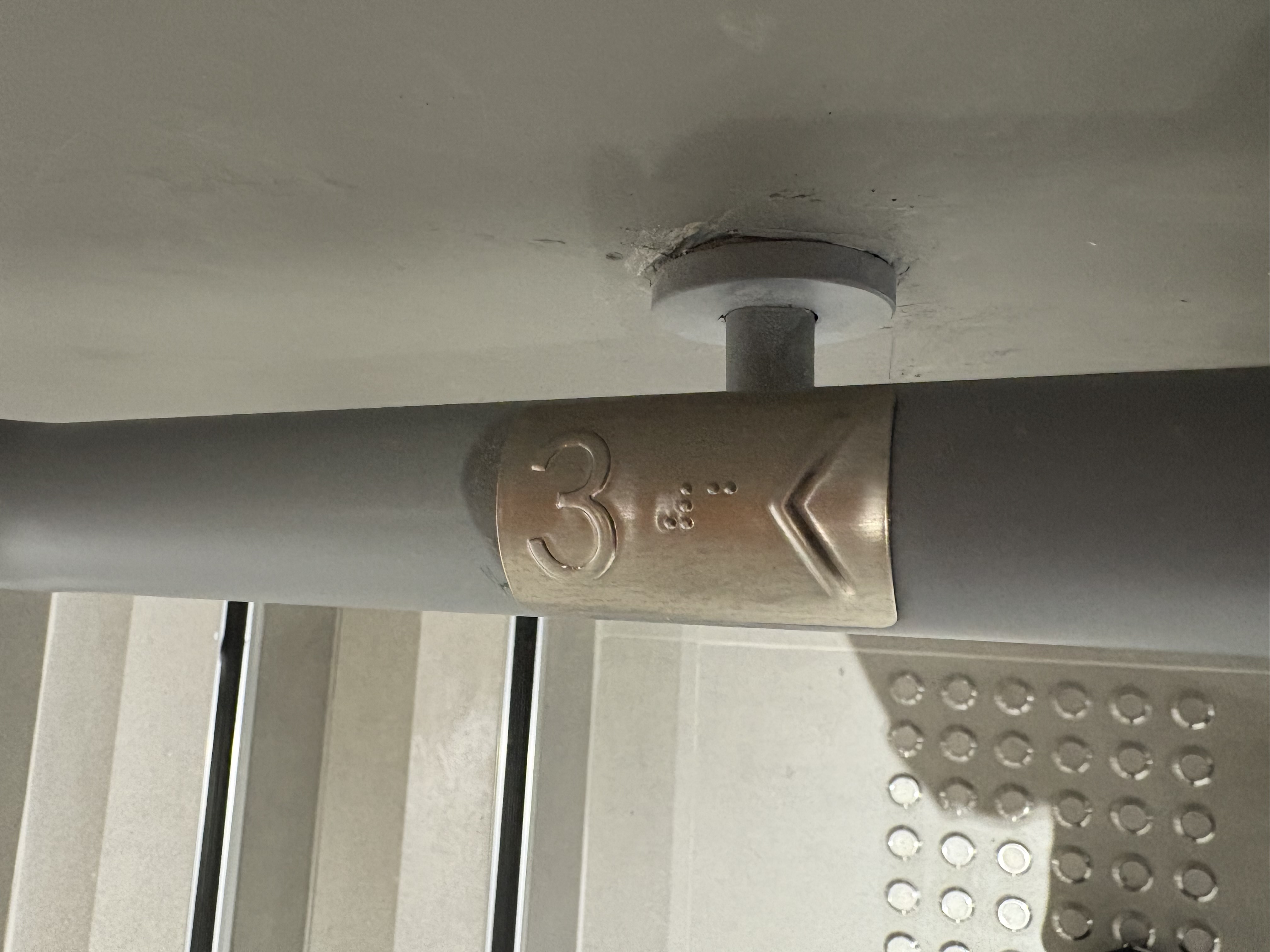 Staircase with braille and tactile information on handrail Accessible toilets (Photo 6)